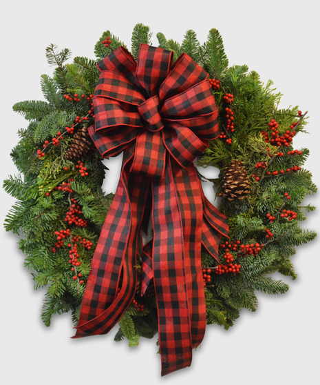 Rustic wreath with a buffalo plaid ribbon